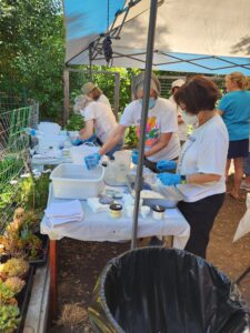 Guild members standing at dye tables