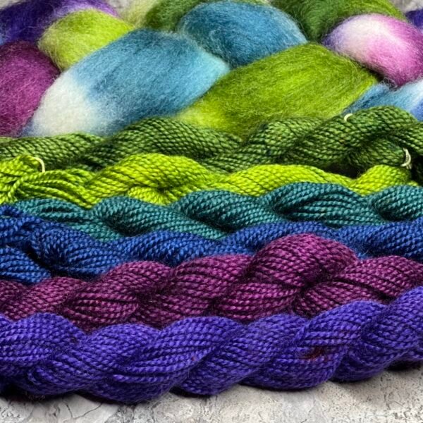 Dyed roving and skeins of yarn