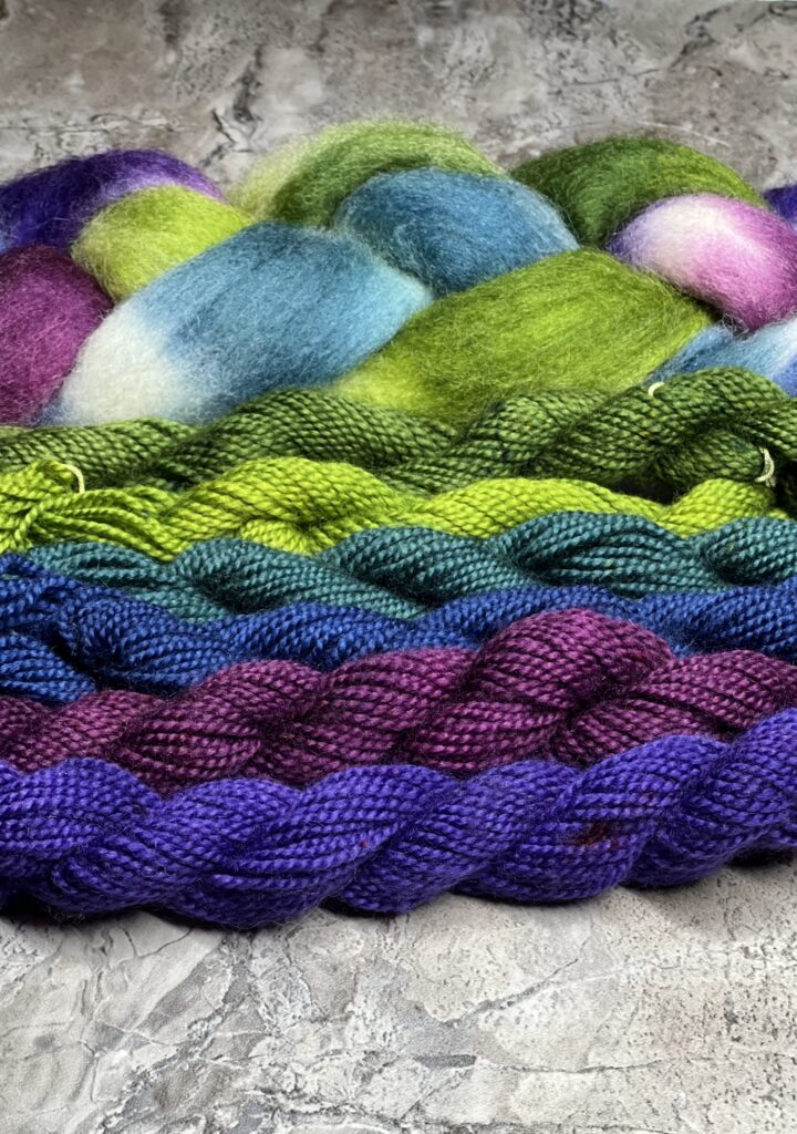 Dyed roving and skeins of yarn