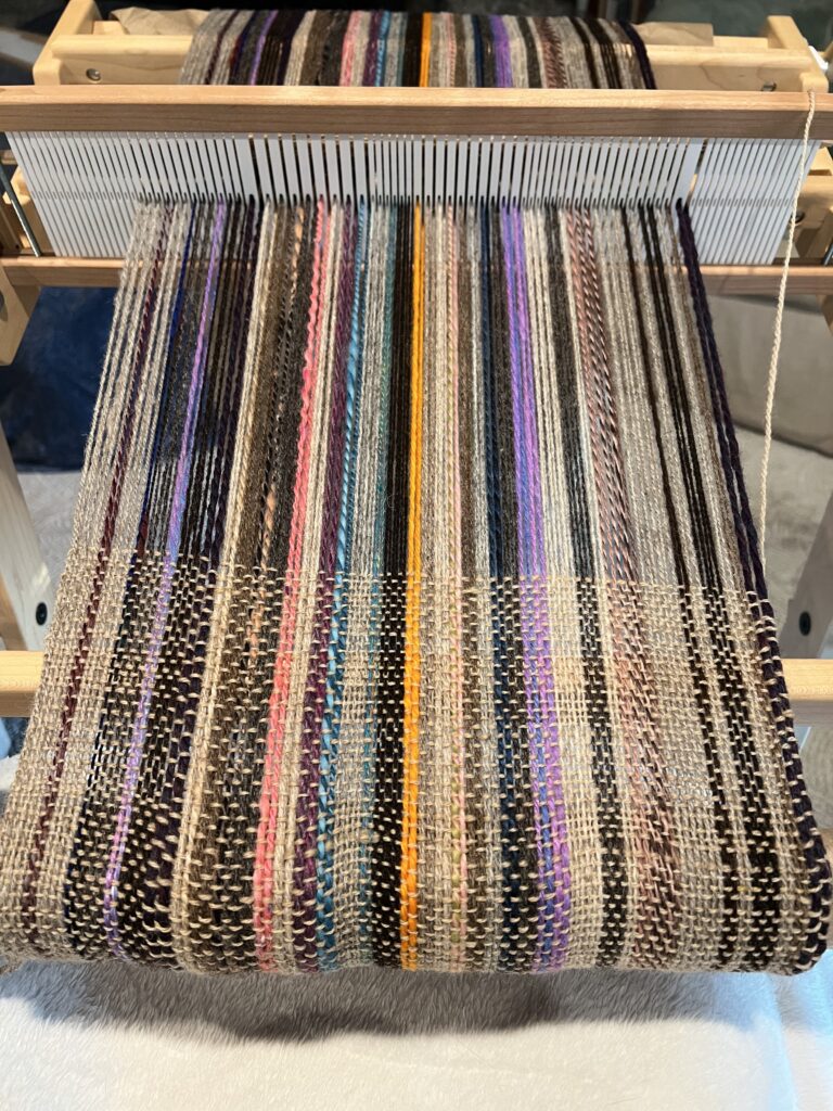 striped weaving on a rigid heddle loom with a variable dent heddle